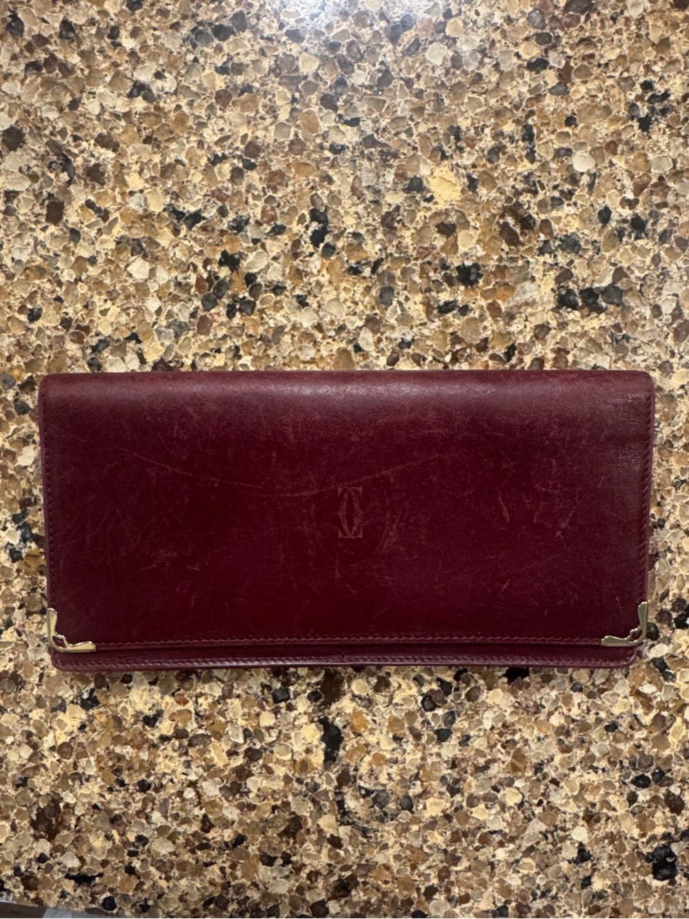 Cartier Burgundy Leather Continental Wallet with Gold Accents